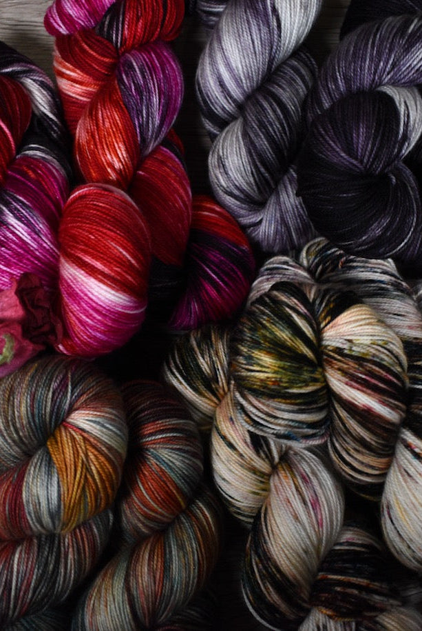 Merino and cashmere blend sock yarn hand dyed in various colours.