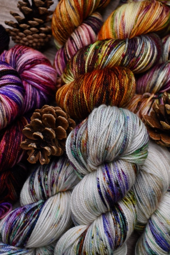 Hand dyed merino sport weight yarn in a variety of colours.