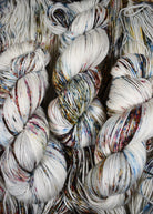 Blue pink and brown speckled hand dyed merino cashmere yarn.