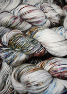 Blue pink and brown speckled hand dyed merino cashmere yarn.