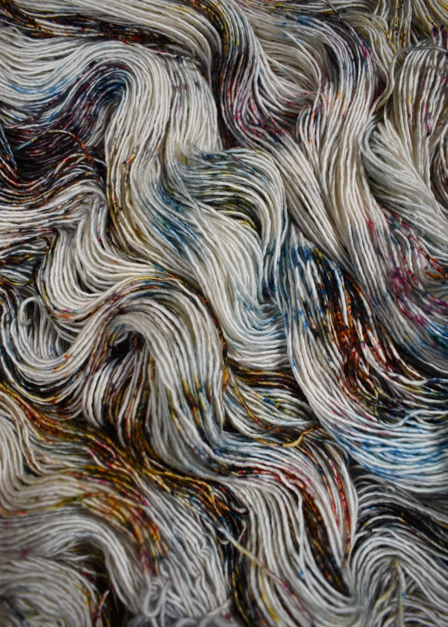 Blue speckled hand dyed merino cashmere yarn.