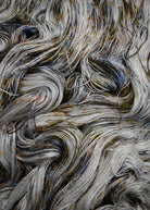 Speckled hand dyed bamboo sock yarn.