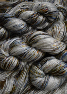 Speckled hand dyed bamboo sock yarn.
