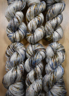 Speckled hand dyed bamboo sock yarn.