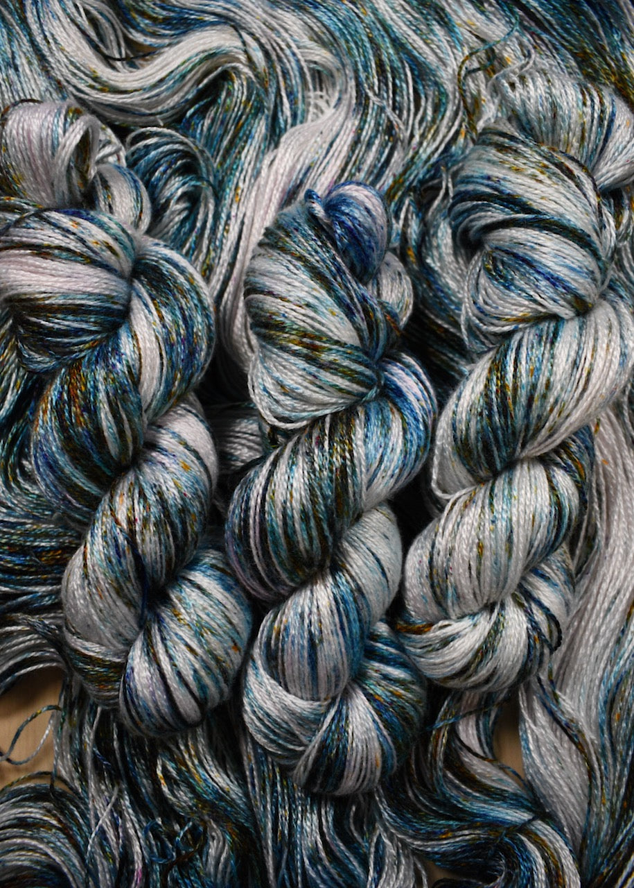 Hand dyed bamboo sock yarn.