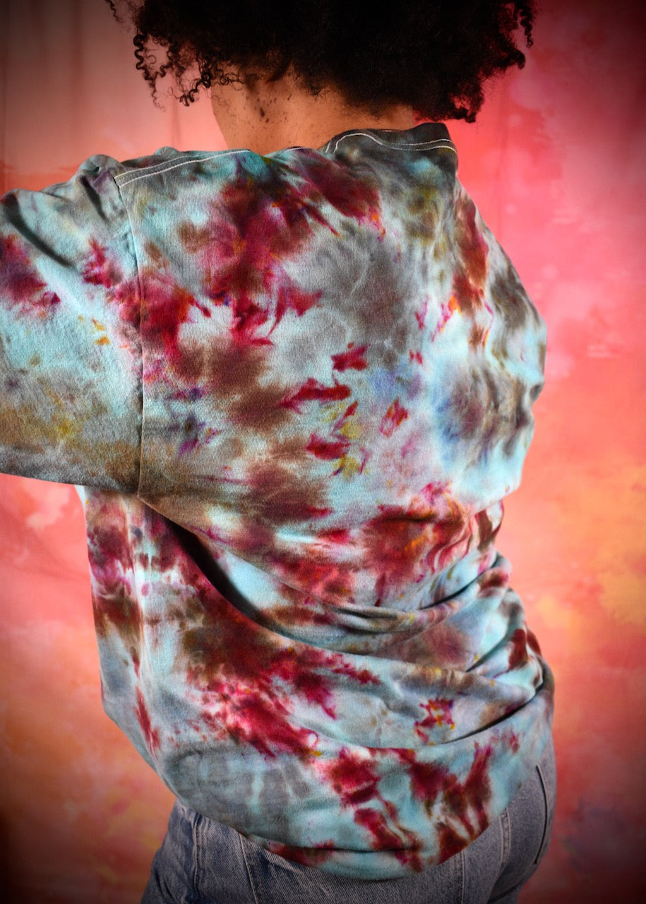 Hand dyed ice dye green turquoise and red cotton t-shirt.