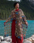 Crochet shawl pattern with motifs using hand dyed yarn.