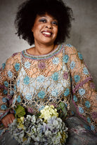 Crochet lace sweater pattern using hand dyed silk yarn.