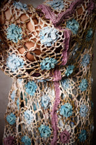 Crochet lace sweater pattern using hand dyed silk yarn.