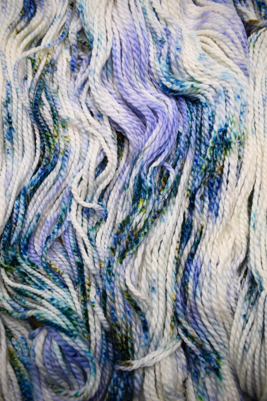 Blue speckled hand dyed merino bulky yarn.