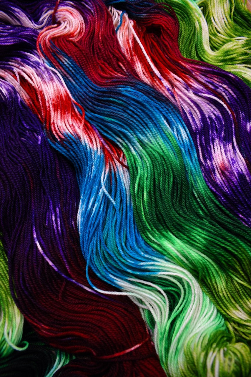 Green blue red merino sock yarn hand dyed.