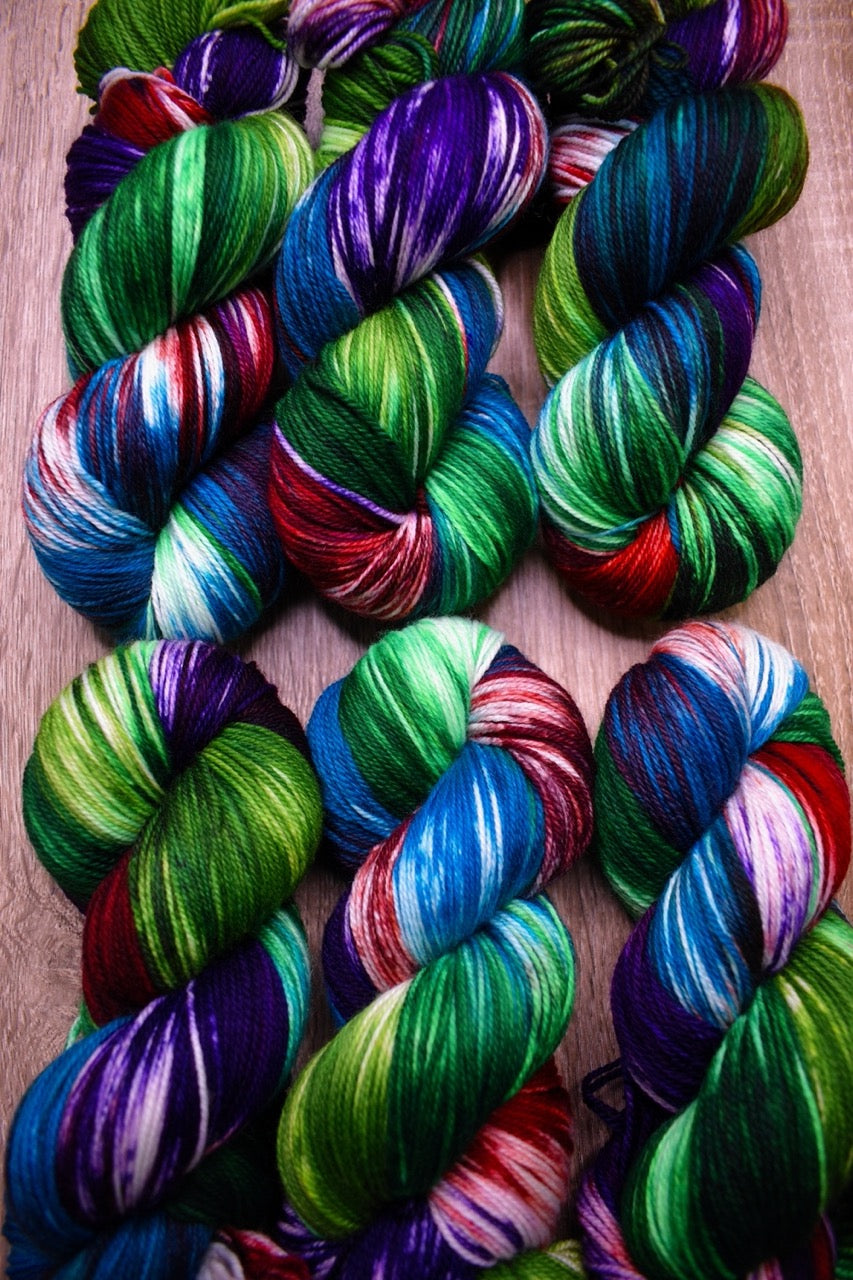 Green blue red merino sock yarn hand dyed.