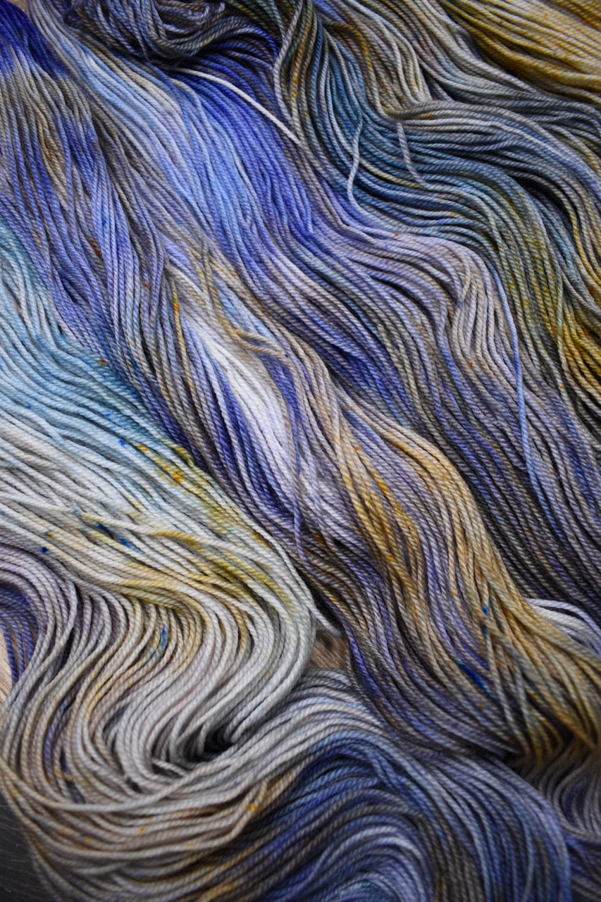 Blue and tan merino wool sock yarn hand dyed.