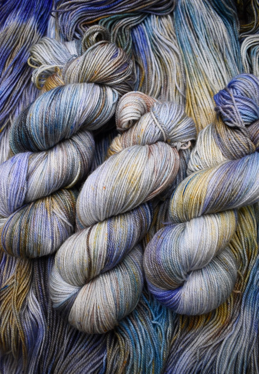 Blue and tan merino wool sock yarn hand dyed.