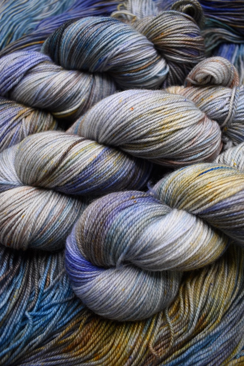 Blue and tan merino wool sock yarn hand dyed.