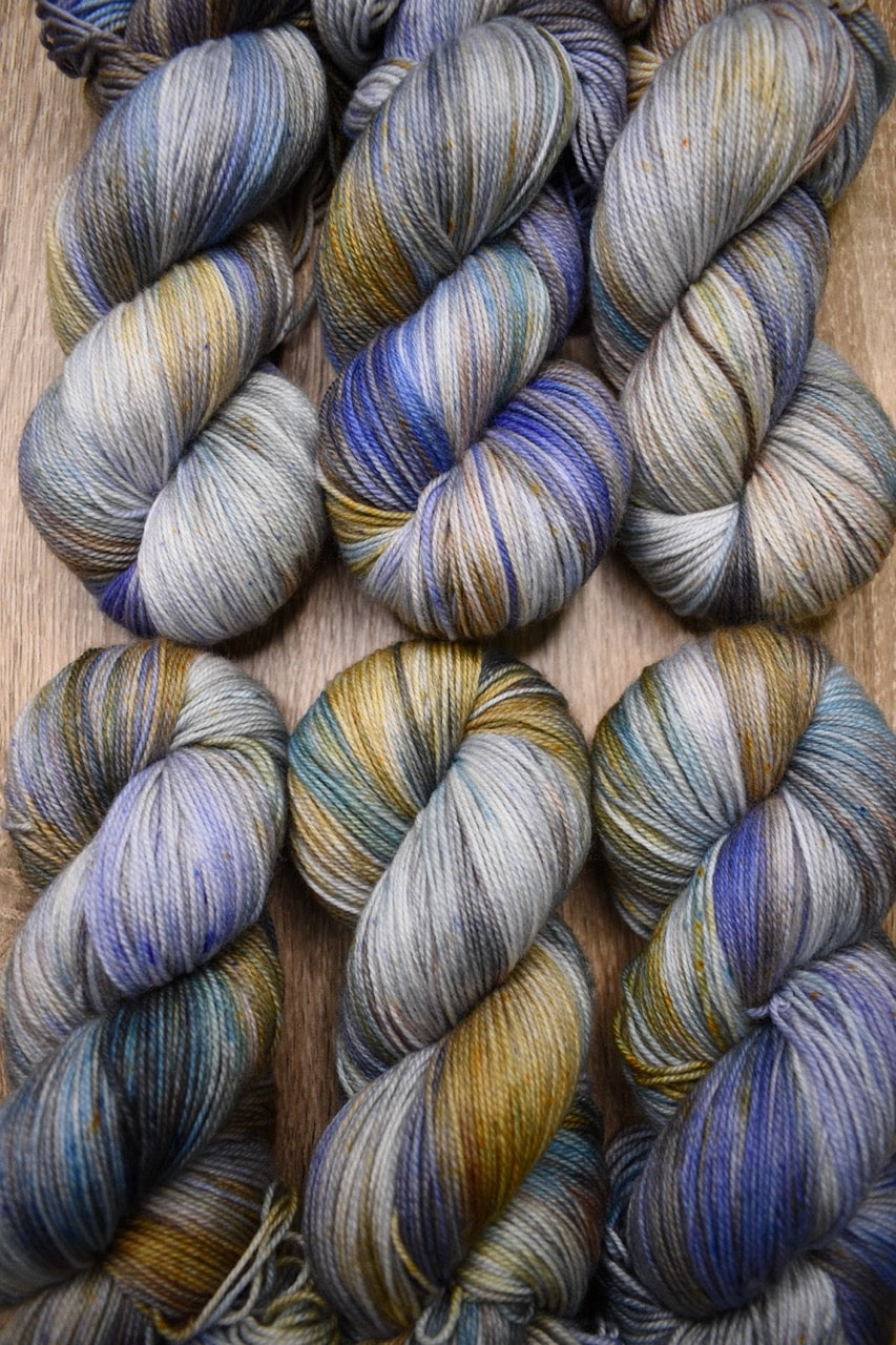 Blue and tan merino wool sock yarn hand dyed.