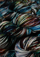 Multi colour speckled merino hand dyed worsted yarn.
