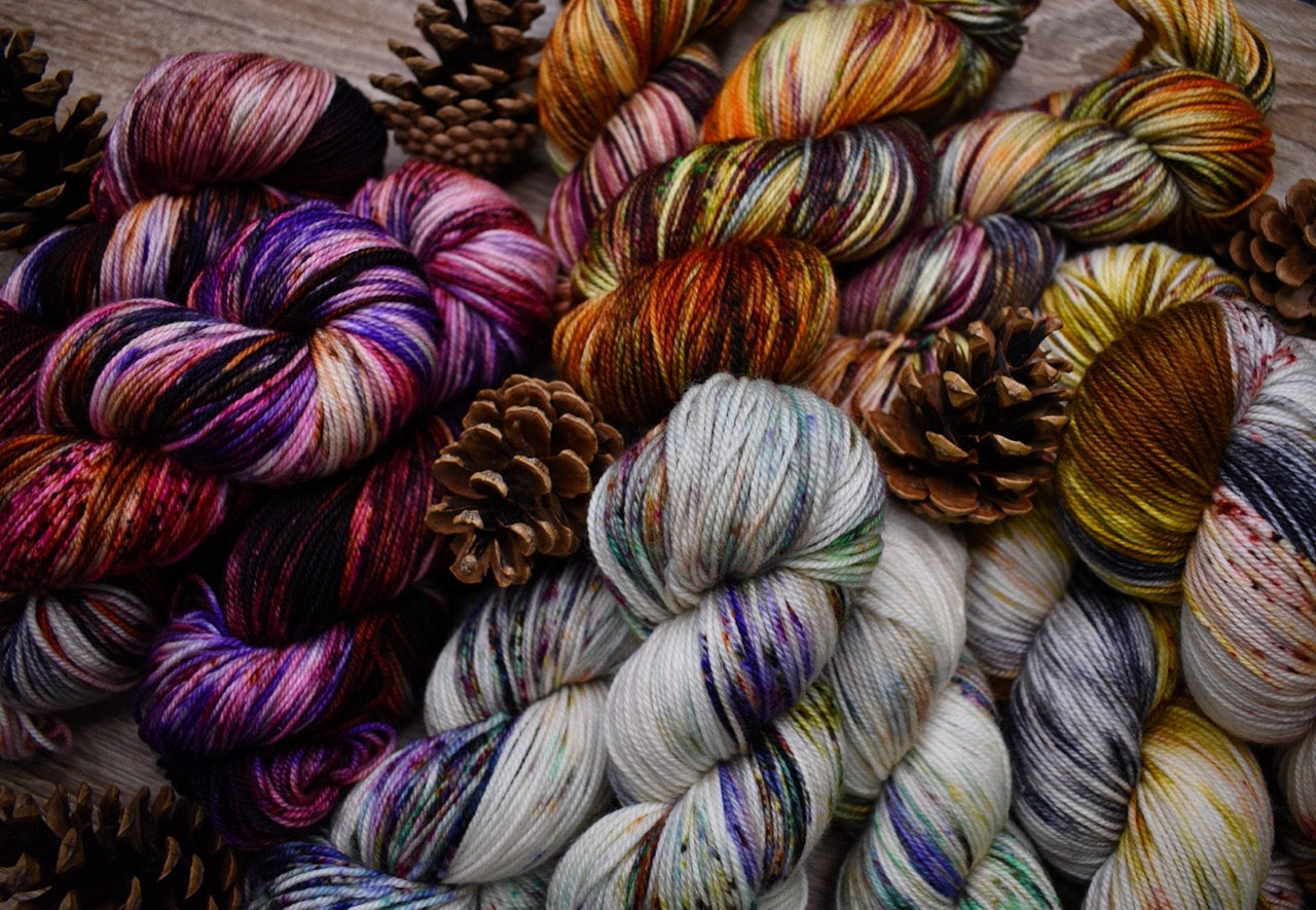 Hand dyed merino sport weight yarn in a variety of colours.