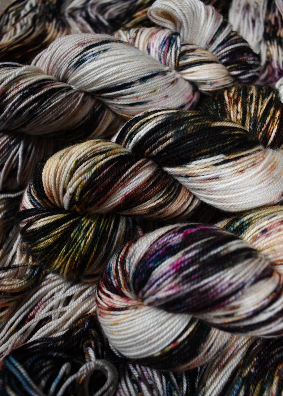 Multi colour speckle hand dyed sock yarn merino cashmere.