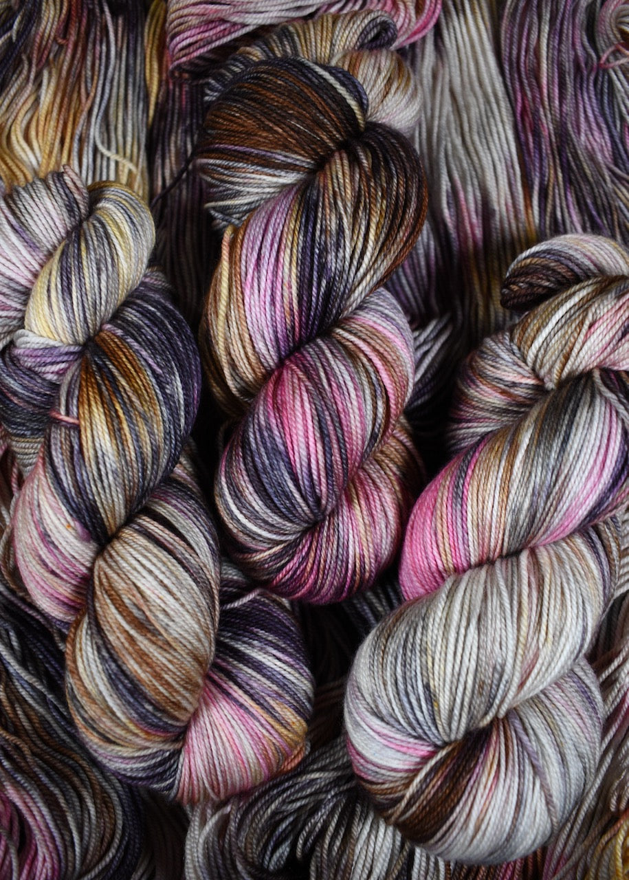 Pink and gray merino cashmere sock yarn hand dyed.