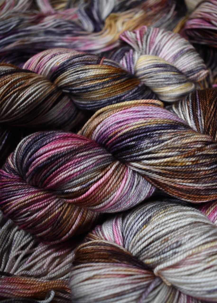 Pink and gray merino cashmere sock yarn hand dyed.