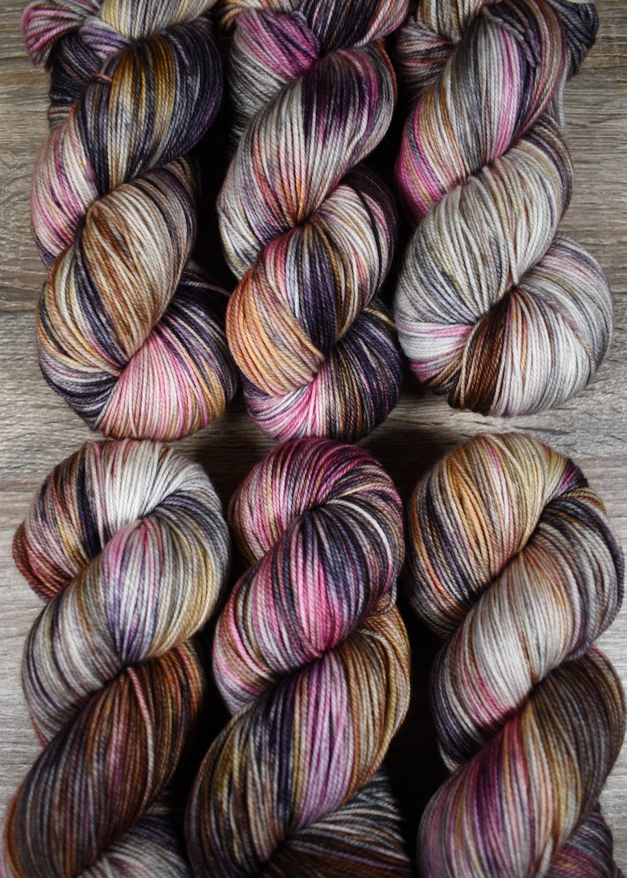 Pink and gray merino cashmere sock yarn hand dyed.