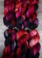 Hand dyed cashmere silk yarn in red colour.