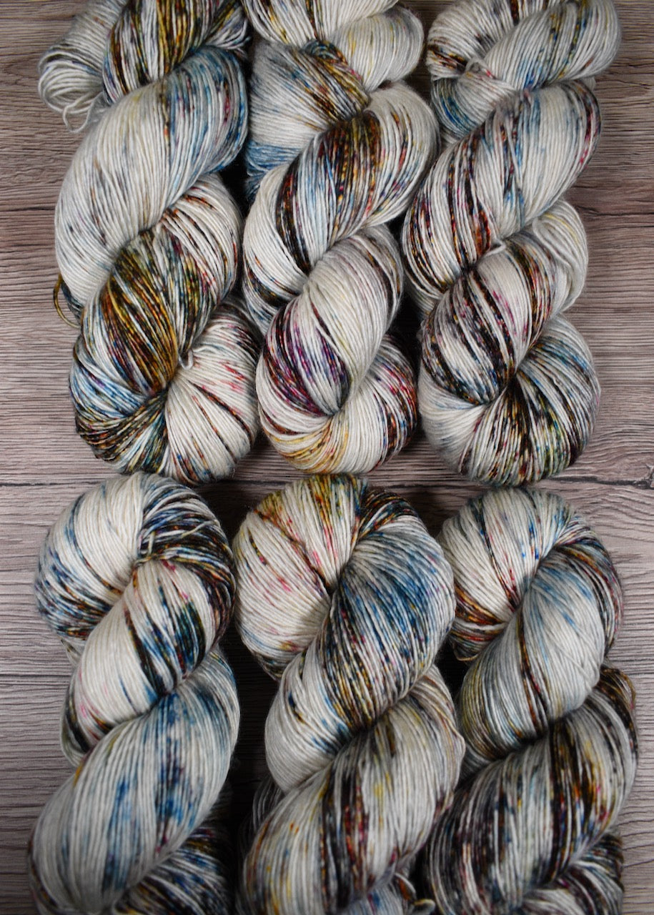 Blue speckled hand dyed merino cashmere yarn.
