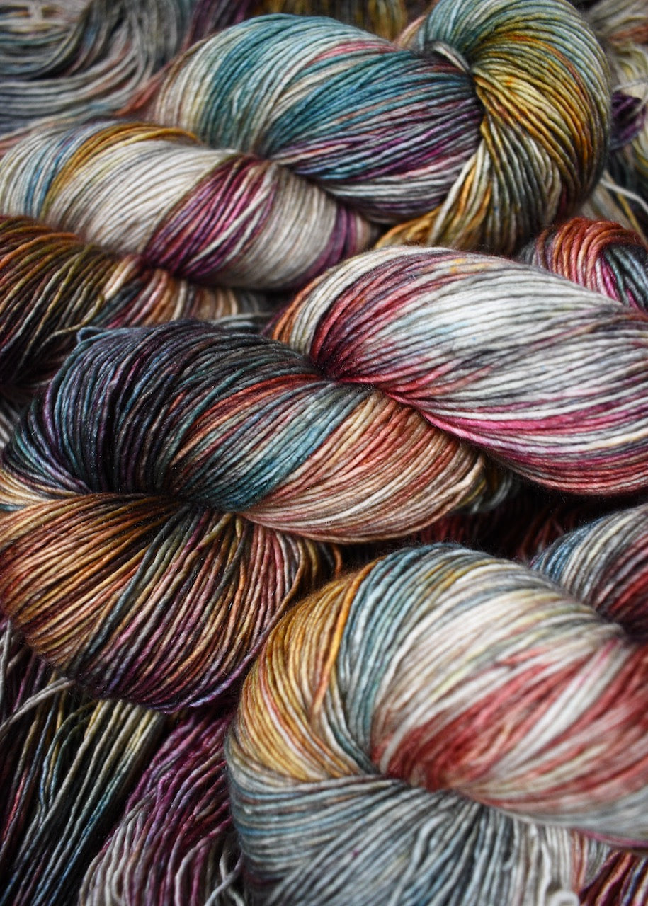 Hand dyed merino cashmere silk yarn in rainbow colours.