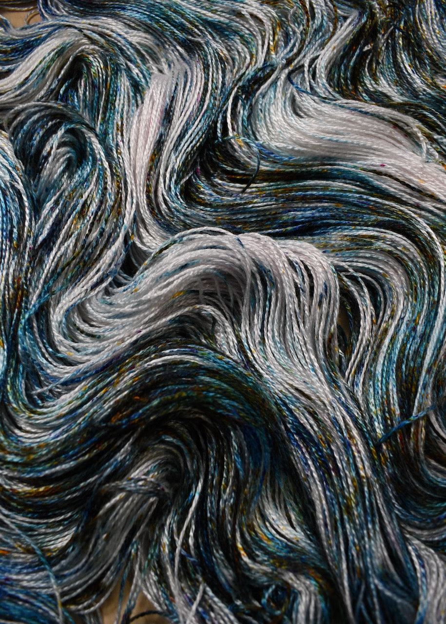 Hand dyed bamboo sock yarn.