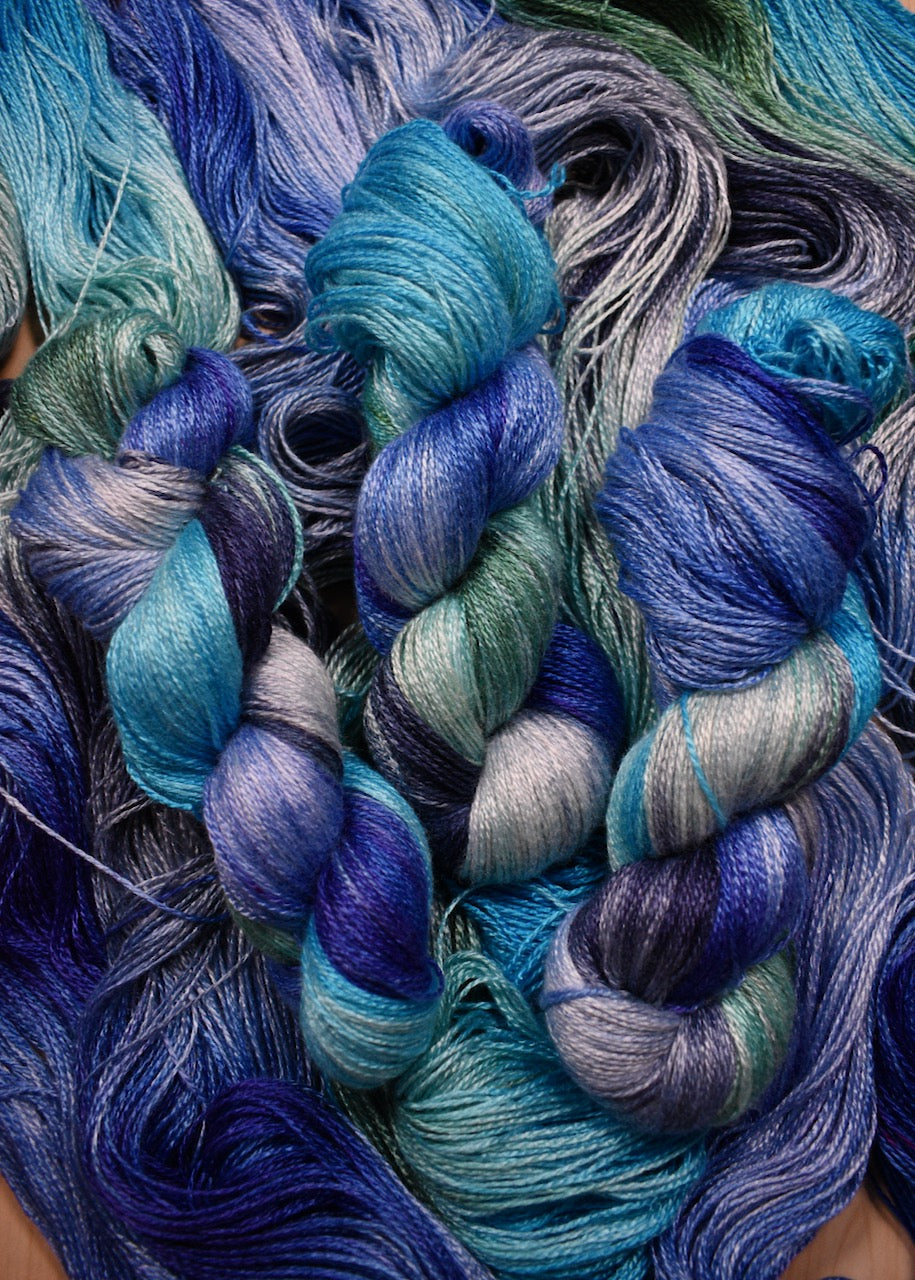 Hand dyed blue bamboo sock yarn.