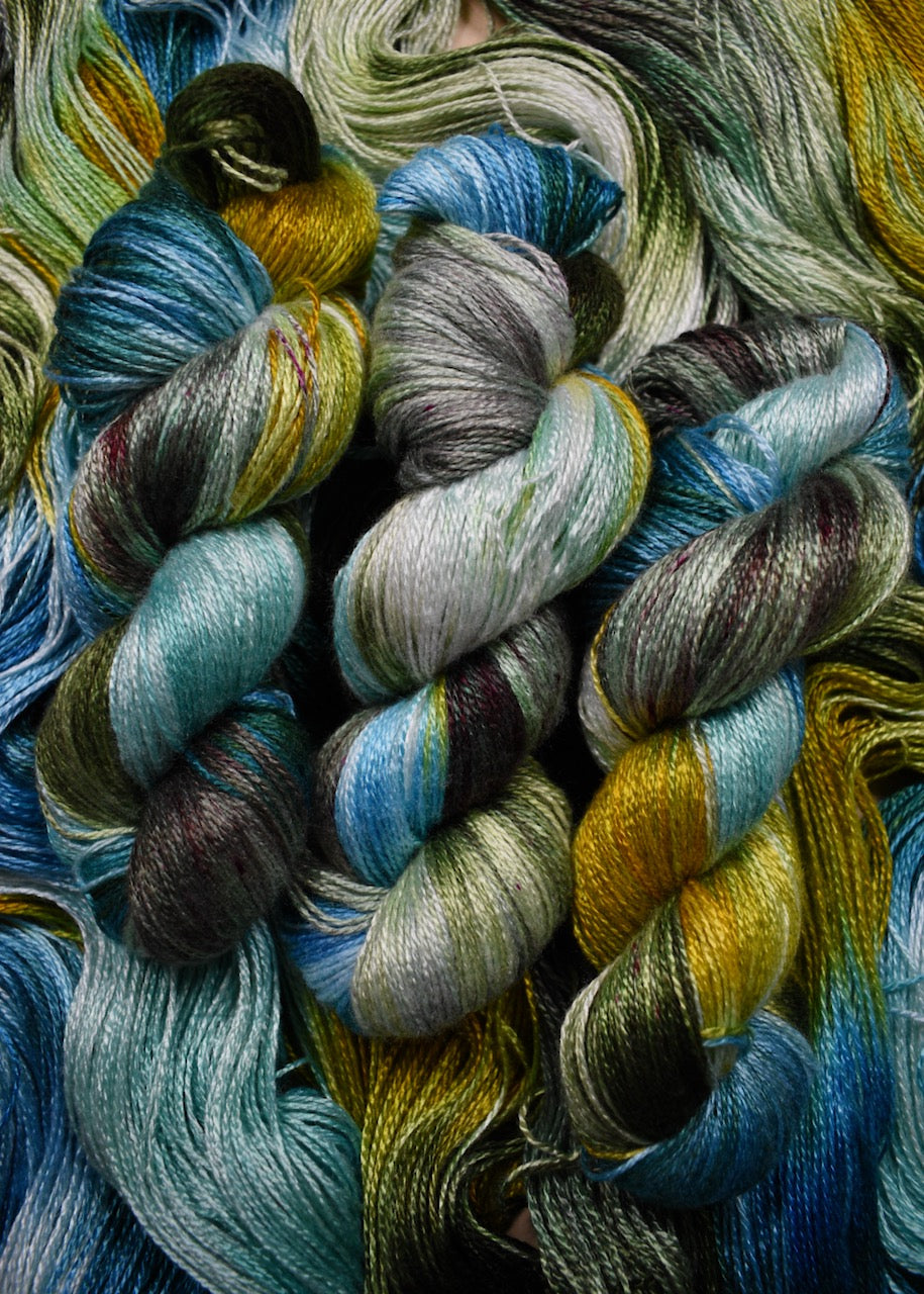 Hand dyed green and blue bamboo sock yarn.