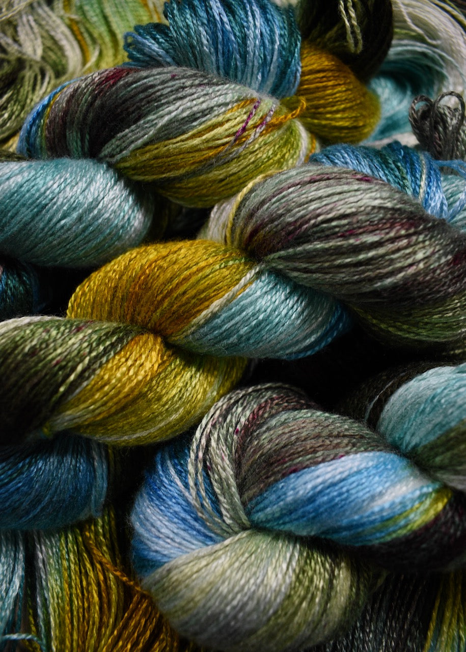 Hand dyed green and blue bamboo sock yarn.