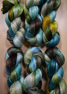 Hand dyed green and blue bamboo sock yarn.