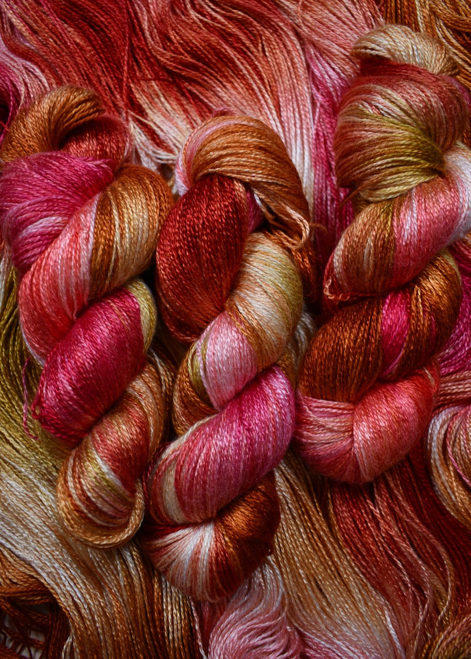 Peach and yellow colour hand dyed bamboo sock yarn.