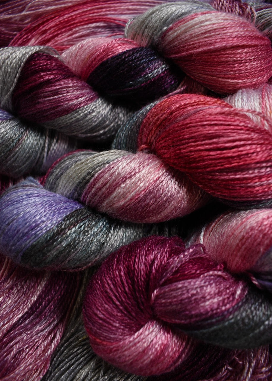 Hand dyed pink and purple bamboo sock yarn.