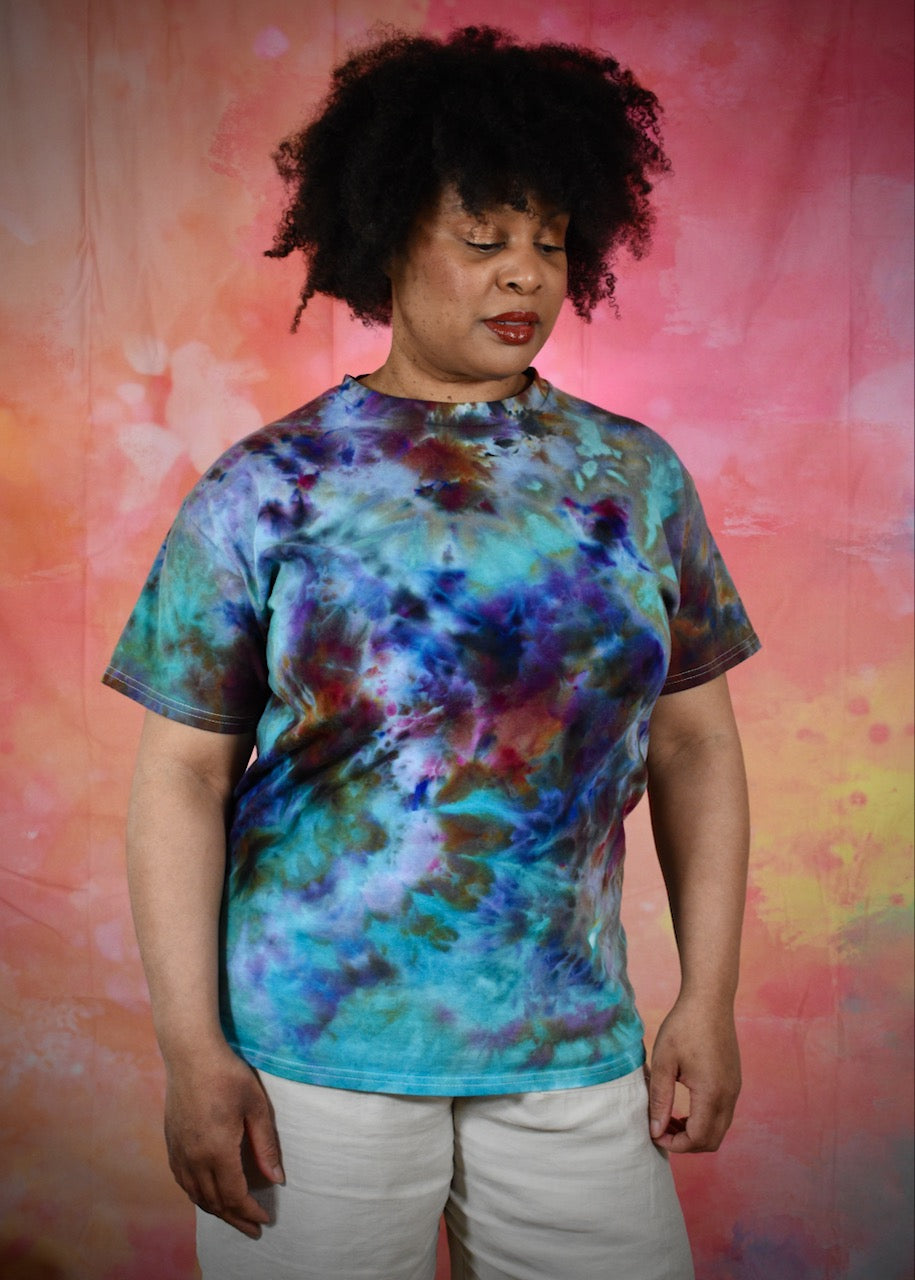 Hand dyed cotton unisex t-shirt bright blue green and red colours.