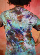 Hand dyed cotton unisex t-shirt bright blue green and red colours.