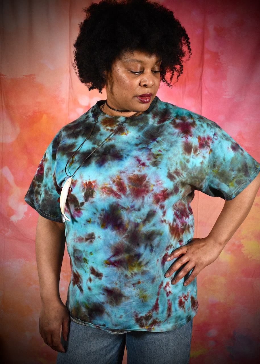 Hand dyed ice dye green turquoise and red cotton t-shirt.