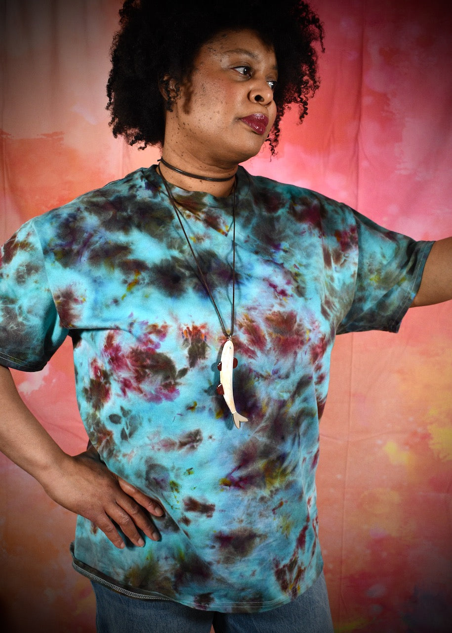 Hand dyed ice dye green turquoise and red cotton t-shirt.