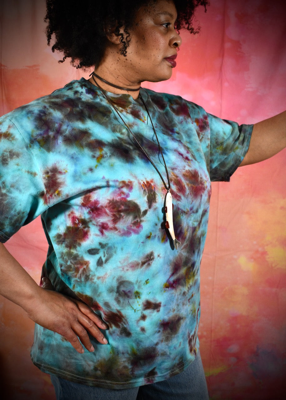 Hand dyed ice dye green turquoise and red cotton t-shirt.
