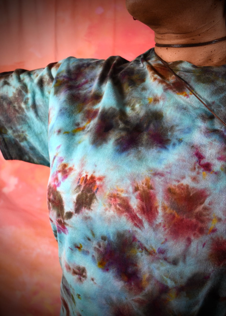 Hand dyed ice dye green turquoise and red cotton t-shirt.