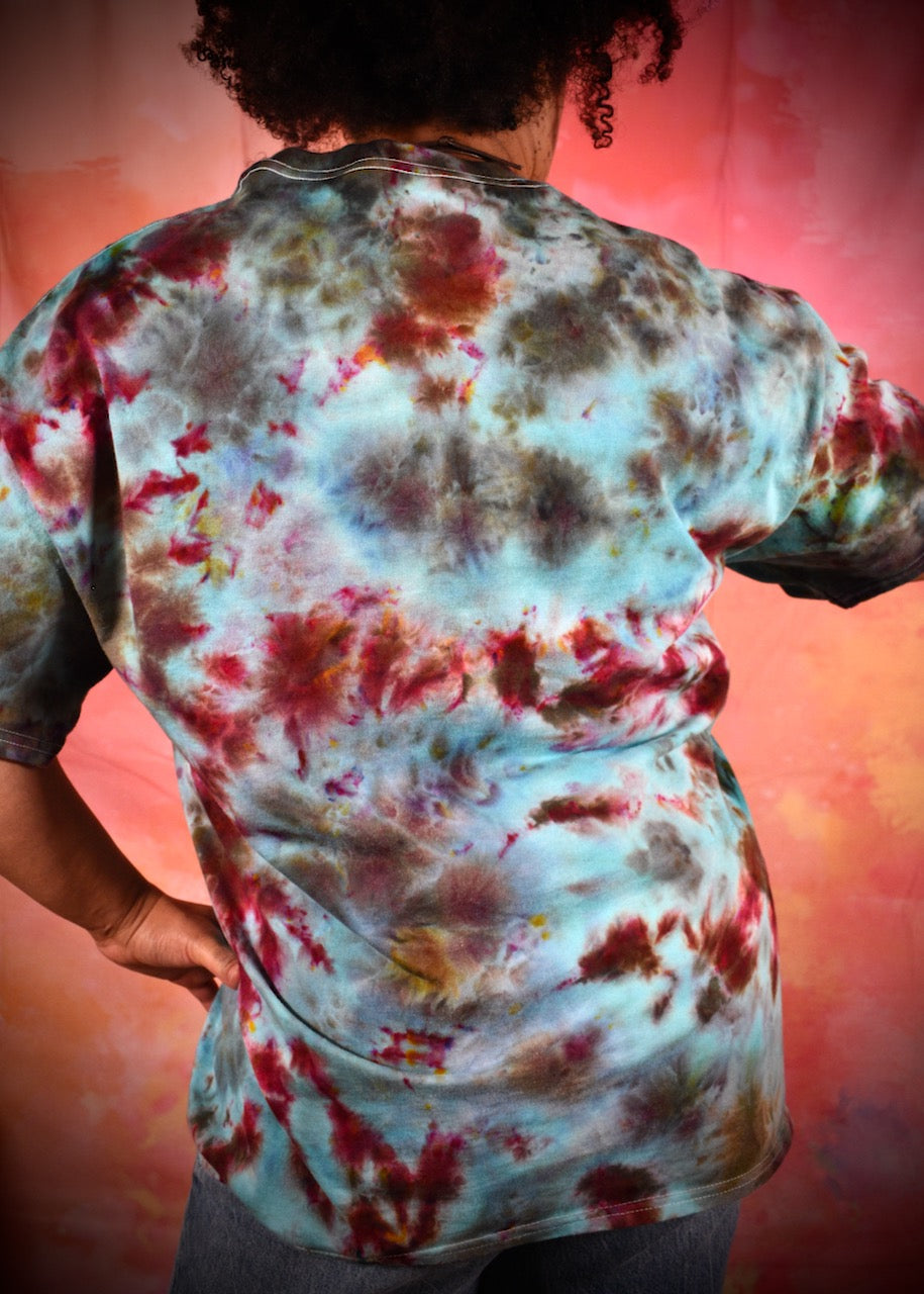 Hand dyed ice dye green turquoise and red cotton t-shirt.