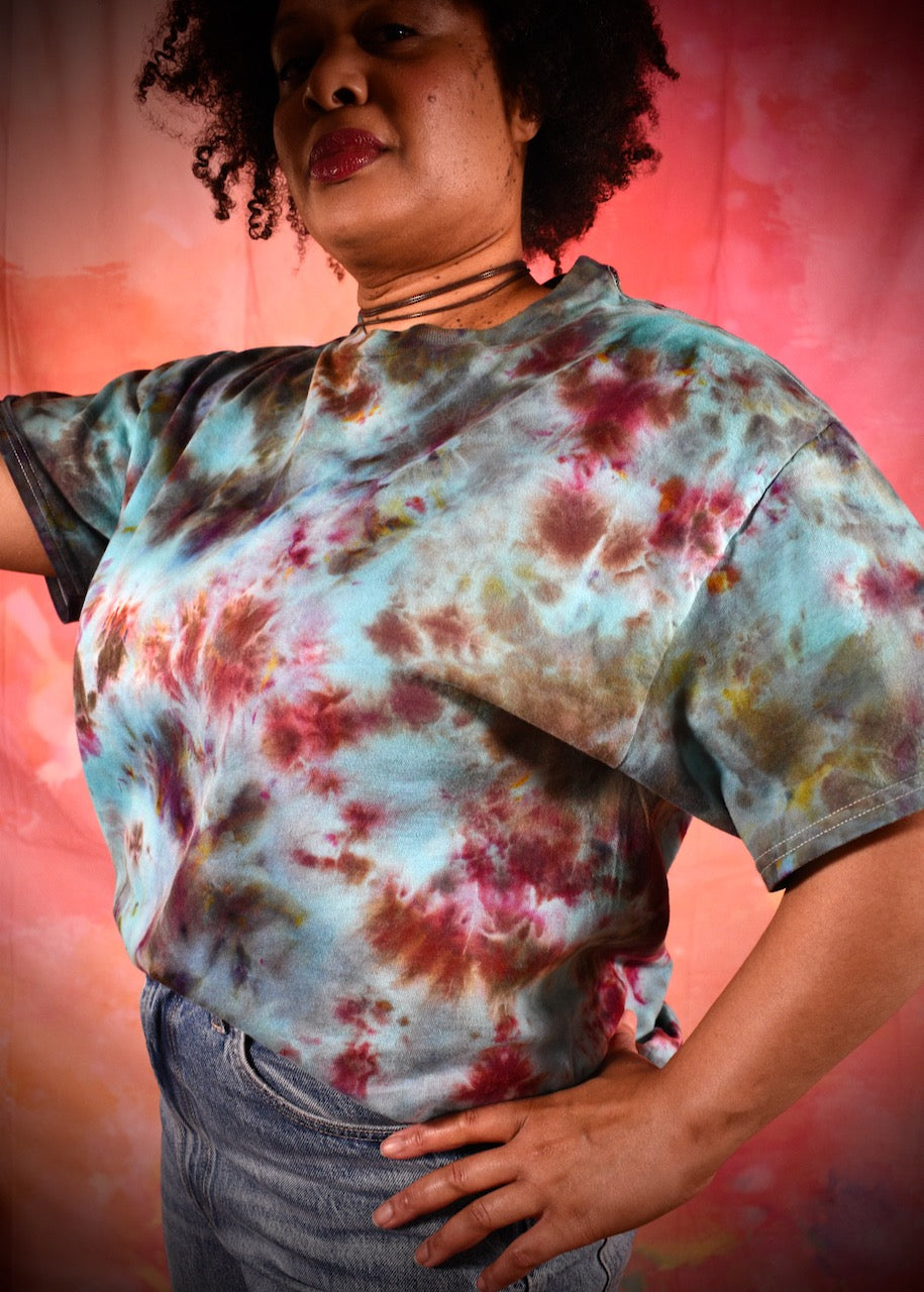 Hand dyed ice dye green turquoise and red cotton t-shirt.