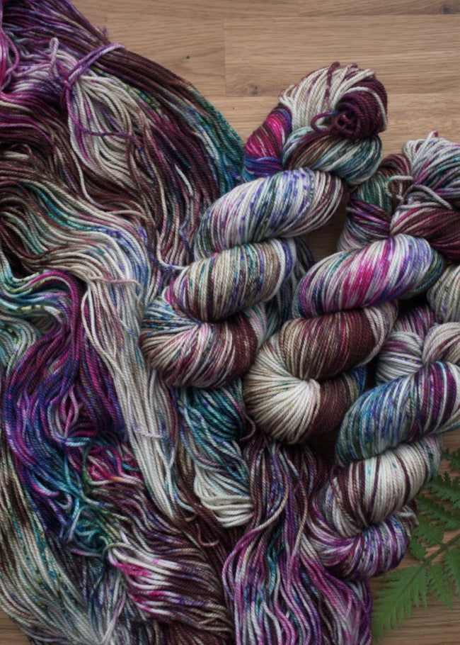 Hand dyed merino and cashmere sport weight yarn.