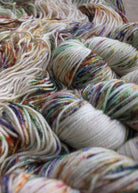 Hand dyed merino cashmere sport yarn with colourful speckles.