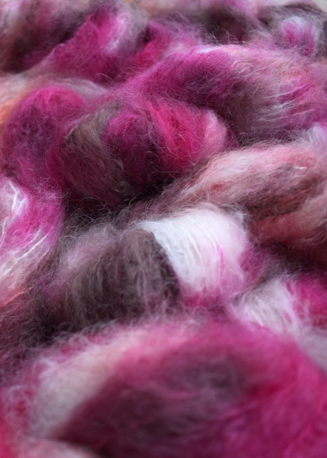 Pink speckled hand dyed dk weight mohair yarn.