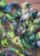 Hand dyed bright green speckled mohair yarn.