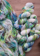 Multi colour speckled merino worsted hand dyed yarn.