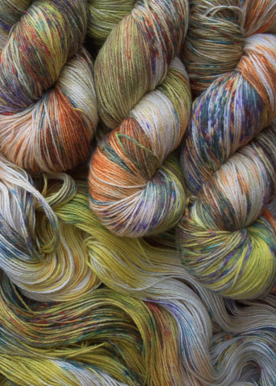 Hand dyed silk and linen sock weight yarn.